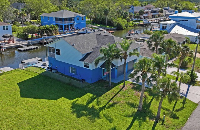 Spacious 5-bed, 3 bath waterfront pool home on canal leading to Gulf of America!