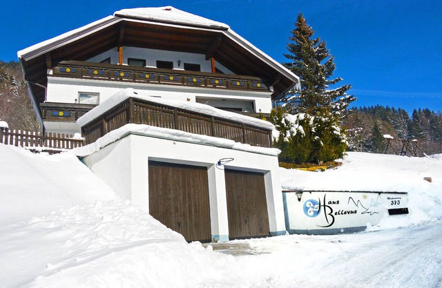 Spacious and well-appointed apartment with private balcony and mountain view