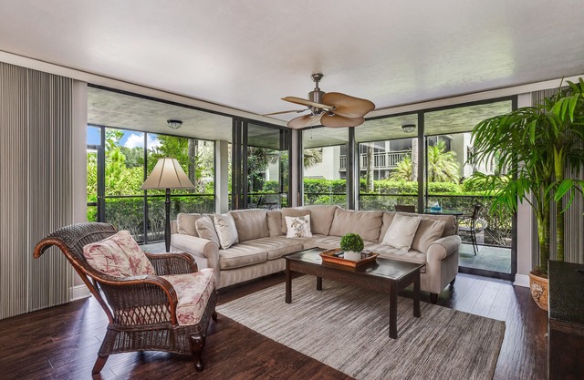 Spacious, air-conditioned condo with private W/D, beach shuttle, & central AC