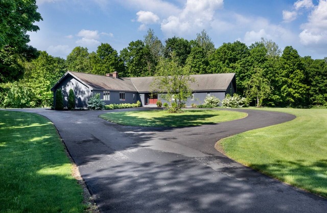 Spacious Home nestled along the Blackberry River in Northwest CT