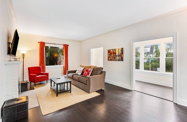 Spacious home with fenced yard, patio, & sunroom - near UW/Green Lake