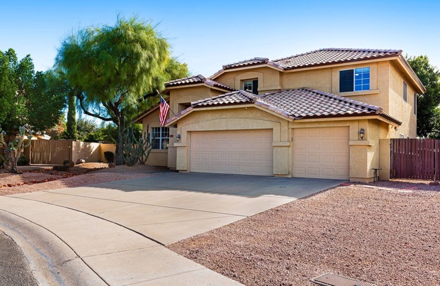 Spacious home with heated pool, wonderful backyard & great location