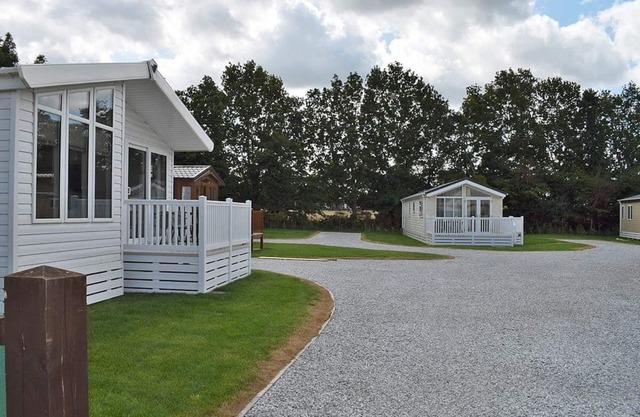 Spacious, modern lodge with two doubles and one twin.