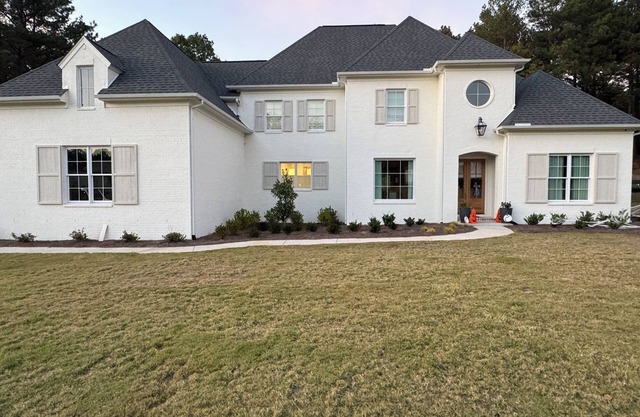 Spacious newly built home with a pool and outdoor kitchen.