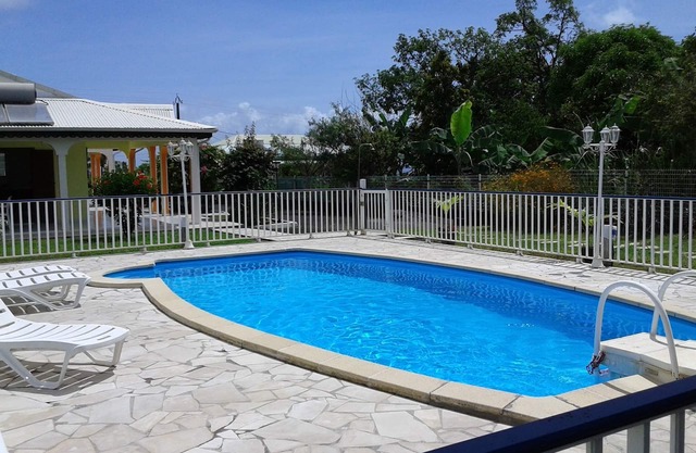 Spacious self-catering cottages with lovely terrace and shared swimming pool, in a peaceful setting.