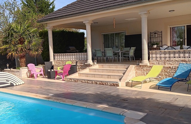Spacious villa with canal-side pool