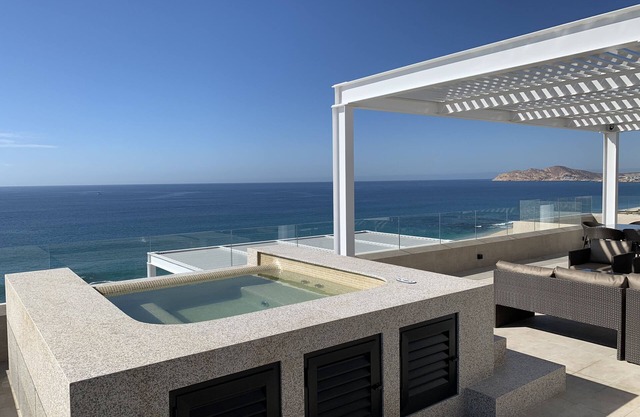 Spectacular 3 bedroom PH condo with massive terrace and panoramic ocean views .