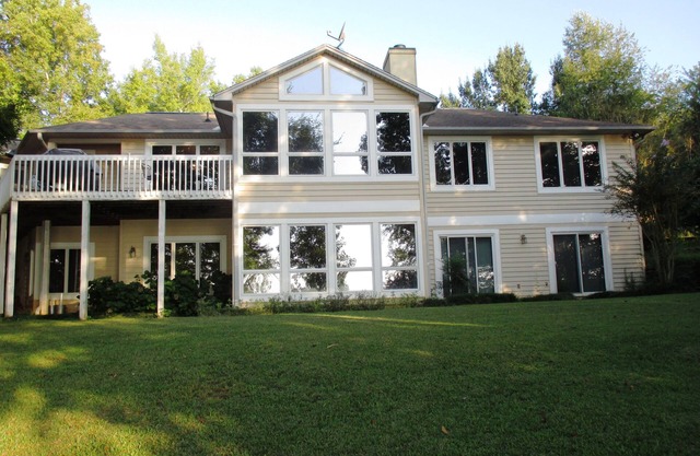 Spectacular lake home with dock and fire pit- room for all - good pets ok-