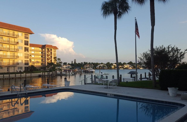 Spectacular View of Moorings Bay from This Third Floor Condo