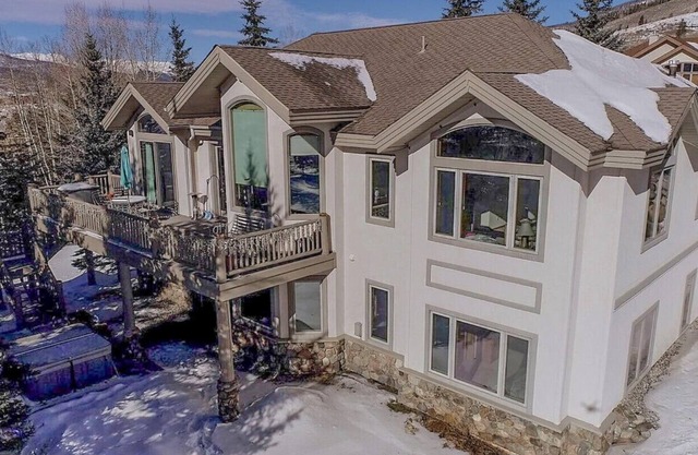 Splendid abode with awe-inspiring views, a hot tub, and a pool table ready!