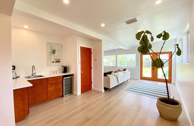 Split floor plan 4 bed 3 bath home! Steps to the sand!
