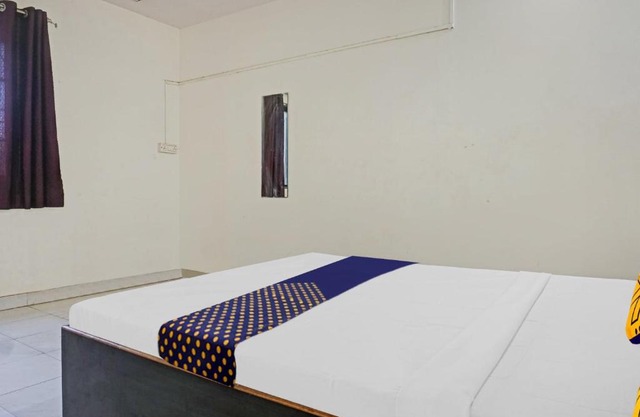 SPOT ON Nisarg Lodging & Boarding