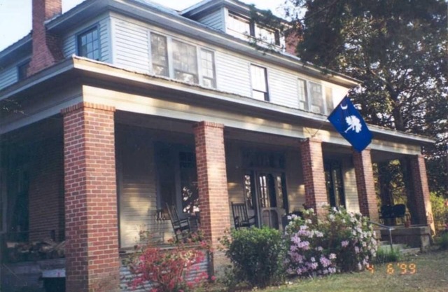 Stately 2-story historic home maintains original charm and charater.