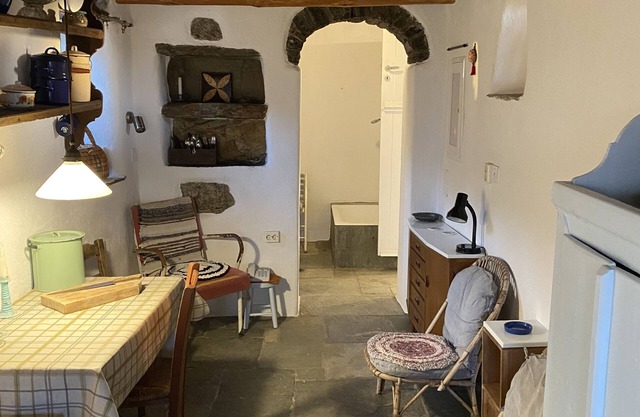 Stone-built cottage with glorious views on its own hillside