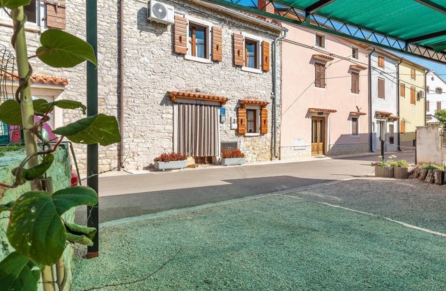 Stone house Malia with garden, BBQ, outdoor shower and bikes