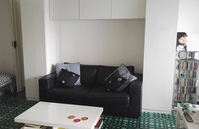 Studio with alcove and terrace in the village center, 200 m from the beach
