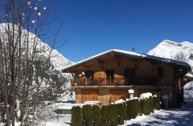 Stunning chalet, catering for up to 12 people, ski and bike access.
