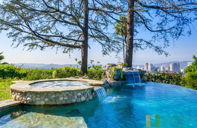 Stunning home with infinity pool, hot tub, and unbeatable panoramic views.