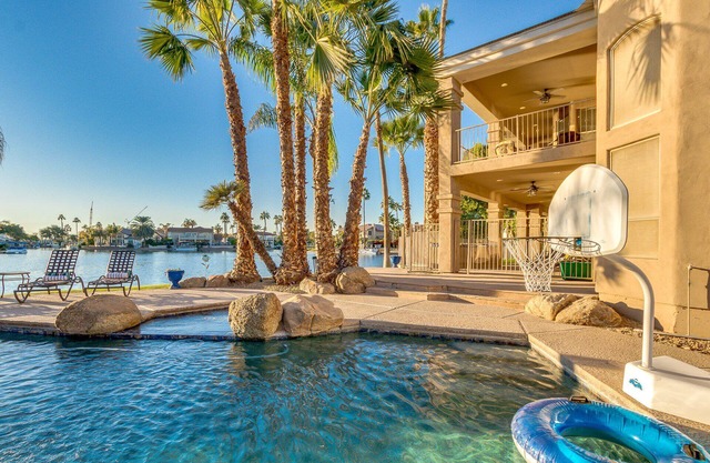 Stunning Waterfront Paradise! Sleeps 16! Heated Pool/Spa and Lots of Fun!