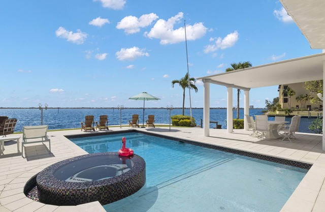 Stunning Waterfront Home With Heated Pool, Hot Tub, Boat Dock + Game Room