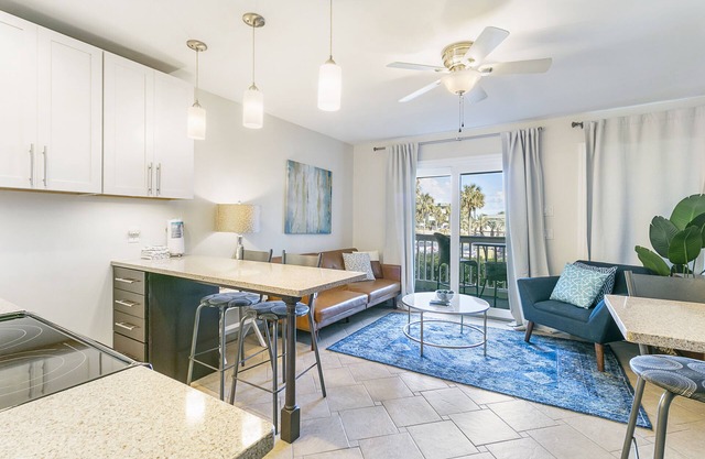 Stylish beachfront condo walking distance to beach, pool, pier and restaurants!