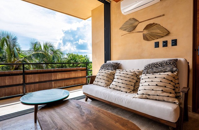 Stylish condo with pool, breezy balcony & full kitchen near cenotes