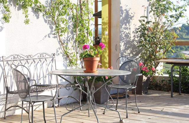 Stylish living in the village square with a large terrace overlooking the Morvan