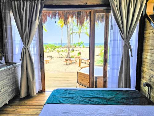 Suite Premium con jacuzzi y playa cerca al Tayrona