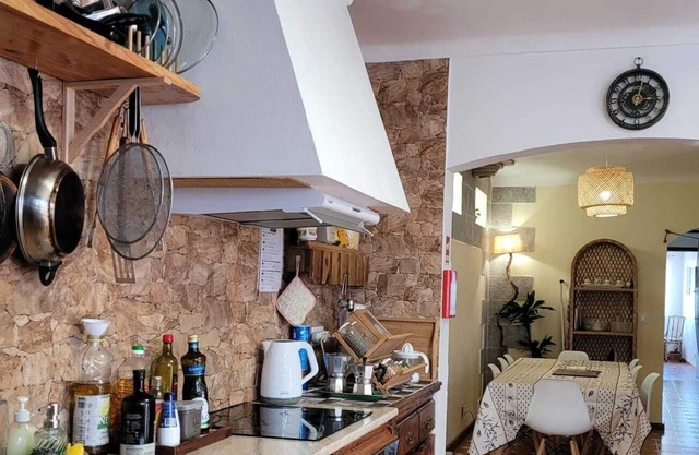 Suite with garden view in guest house near Furnas & Moinhos Beach