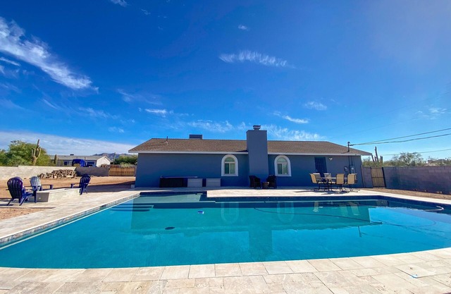 Sunny oasis with private pool, firepit, grill, child-friendly amenities, & desk