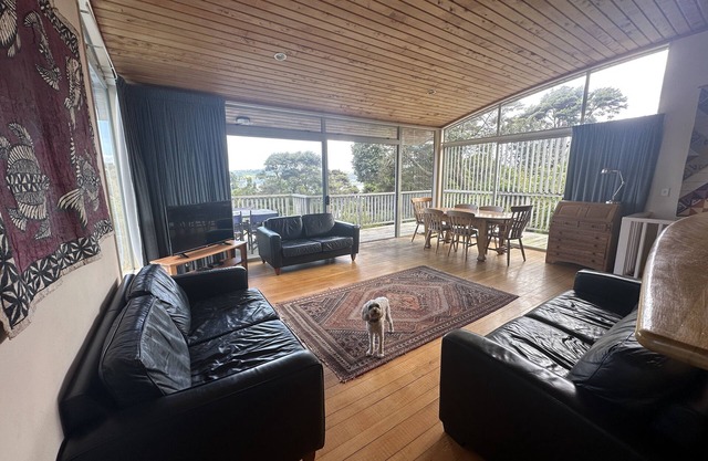 Sunny with decks and bush/harbour views. Three bedrooms. Pet friendly.