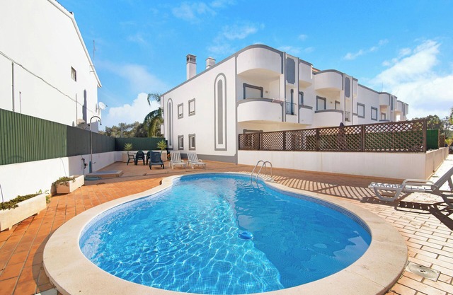 "Sunset" apartment with communal pool, private terrace & WiFi