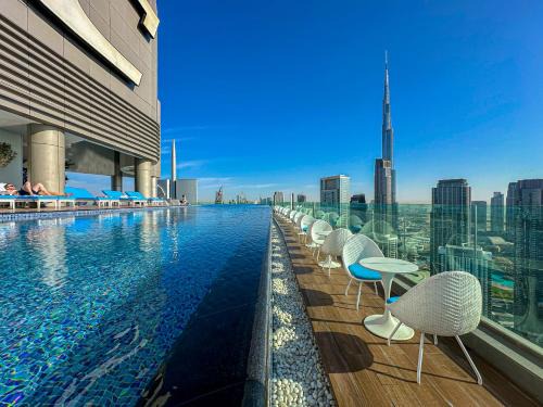 Super High Infinity Pool and amazing Burj Khalifa View 3 Bedroom apartment in Paramount Hotel Midtown