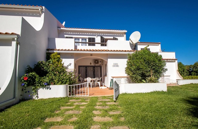 Terraced house Casa Sauchi with a communal pool
