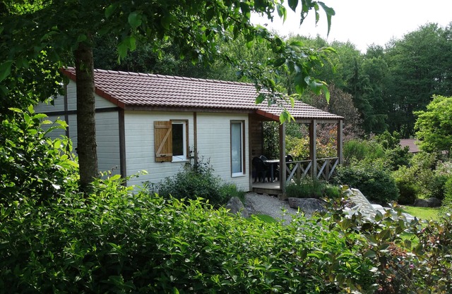 THE FAY: Chalet (Curlew) in edge of pond in full nature.