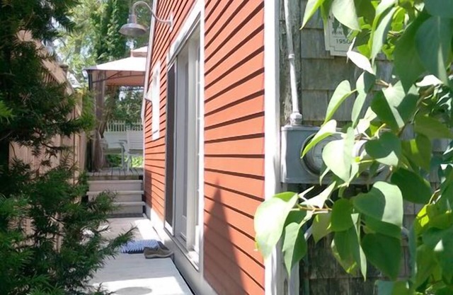 The KLINE Cottage nestled in the quiet West End. PRIME WEEK REDUCED July 5/12.