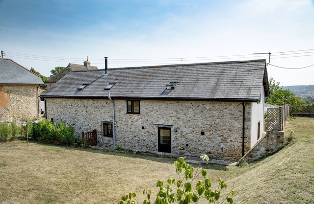 The Old Shippon at Bucknole Farm is a charming stone and slate barn conversion