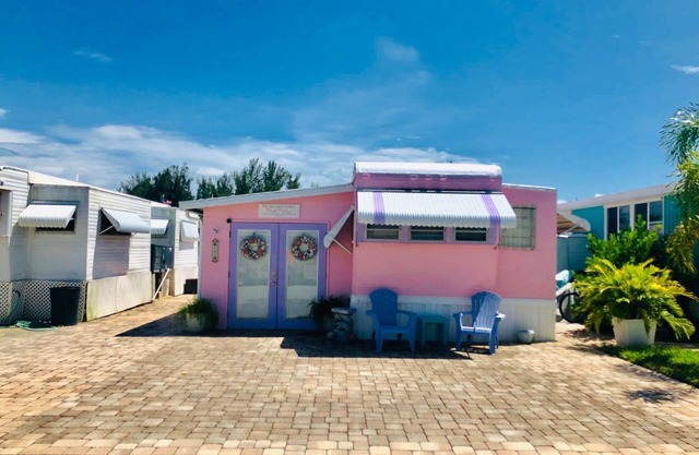 The Pink Palace on the Water- *pool/beach*