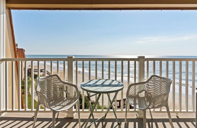 The Pink Pearl - Top Floor Beachfront Boho Condo with Community Pool!