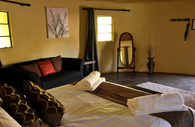 The Queen-Size-Bed Riverside Huts