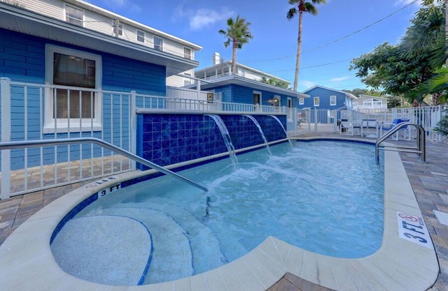 The Reef Quaint Beach Cottage steps to the sand! 2bdrm 1bath with pool