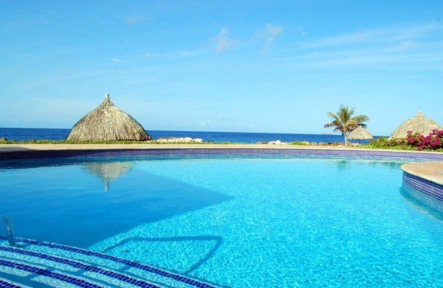 The Strand Sun Ray-Oceanfront Elegance with Lagoon, Pool & Private Beach Access