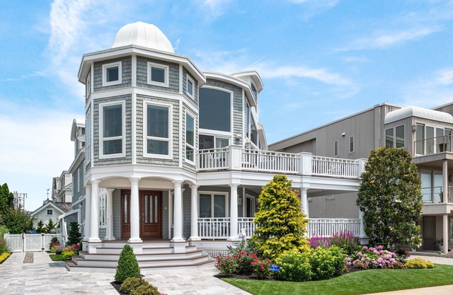 This beautiful home is second from the ocean and has 6 bedrooms and 5 full baths.
