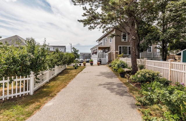 This one bedroom attached unit is three houses from the beach, with ocean views from the bedroom