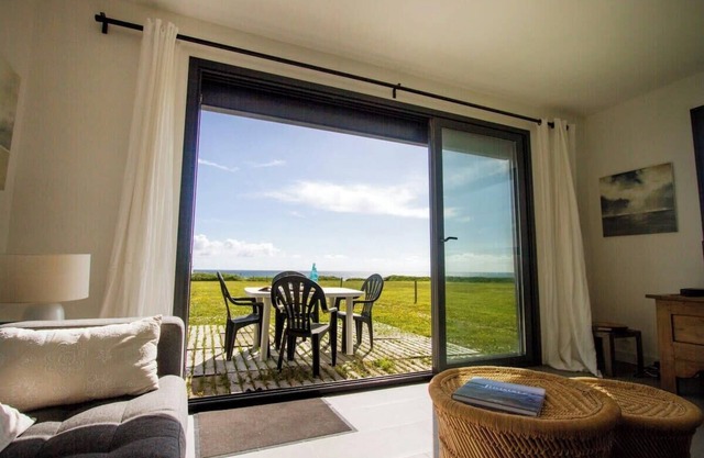 Tipoz'immo-wooden house facing the sea