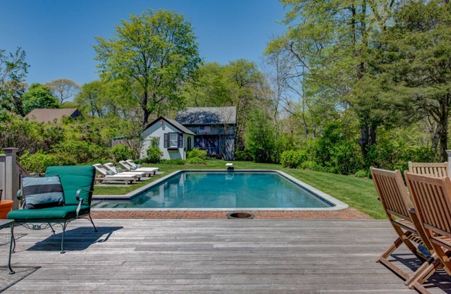 Traditional-style home with private pool, several sitting rooms, back deck,...