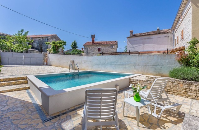 Traditional villa with private pool, sun beds