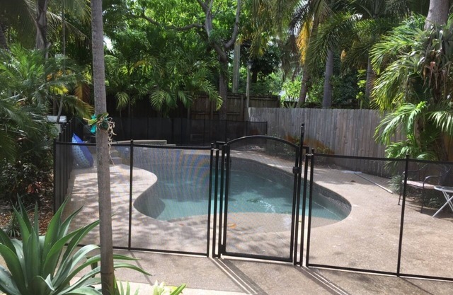 Tropical Heated Pool home in fun beach side town Sleeps 8 Private