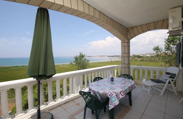 Two bedroom apartment with terrace and sea view Povljana, Pag (A-6502-a)