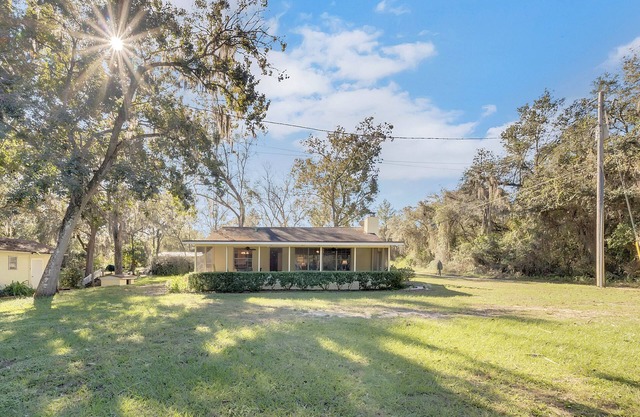 Two lakefront homes on one property near Salt Springs with great porches & yard